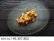 Smoked sardines salad with creamy cheese corn codium and hazelnuts. Стоковое фото, агентство Ingram Publishing / Фотобанк Лори