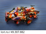 Smoked sardines salad with creamy cheese corn codium and hazelnuts. Стоковое фото, агентство Ingram Publishing / Фотобанк Лори