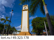 Clock tower on Plaza Punta Langosta in Cozumel Island of Mexico. Стоковое фото, агентство Ingram Publishing / Фотобанк Лори