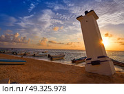 Puerto Morelos sunrise lighthouse in Mayan Riviera Maya of Mexico. Стоковое фото, агентство Ingram Publishing / Фотобанк Лори