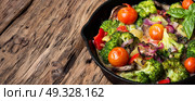 Vegetarian Italian Omelette. Vegetarian Italian omelet on rustic wooden background. Стоковое фото, агентство Ingram Publishing / Фотобанк Лори