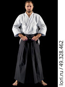 Martial arts fighter isolated on black. Стоковое фото, агентство Ingram Publishing / Фотобанк Лори