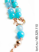 jewerly bracelet  with chalcedony and obsidian around white background. Стоковое фото, агентство Ingram Publishing / Фотобанк Лори