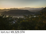 Elevated view of River Mekong, Mount Phousi, Luang Prabang, Laos. Стоковое фото, агентство Ingram Publishing / Фотобанк Лори