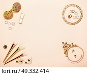 Fashionable Women’s Cosmetics and Accessories. Falt Lay. Stylish Sunglass. Make-Up Lipstick and Brushes. Gold Necklace. Women Accessories. Стоковое фото, агентство Ingram Publishing / Фотобанк Лори