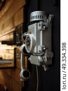 street old phone with a rotary dialer on your office wall. Стоковое фото, агентство Ingram Publishing / Фотобанк Лори