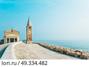 Church of Our Lady of the Angel on the beach of Caorle Italy, Santuario della Madonna dell’Angelo. Стоковое фото, агентство Ingram Publishing / Фотобанк Лори