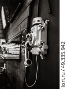 street old phone with a rotary dialer on your office wall. Стоковое фото, агентство Ingram Publishing / Фотобанк Лори