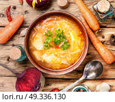 Ukrainian national food-borshch. Homemade food of national Ukrainian cuisine. Borscht with meat and vegetables. Стоковое фото, агентство Ingram Publishing / Фотобанк Лори