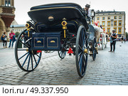 stylized coach in the market square of Krakow. Стоковое фото, агентство Ingram Publishing / Фотобанк Лори
