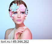 Face of Beautiful Woman Decorated with Flowers. Perfect Makeup. Beauty Fashion Model Woman Face perfect Skin. Paper Flowers. Стоковое фото, агентство Ingram Publishing / Фотобанк Лори