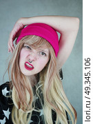 Young woman with attitude . Стоковое фото, агентство Ingram Publishing / Фотобанк Лори