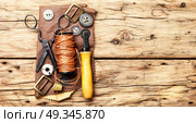 Tools for leather craft. Working tools and cut out pieces of leather. Стоковое фото, агентство Ingram Publishing / Фотобанк Лори