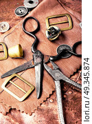 Tools for leather craft. Working tools and cut out pieces of leather. Стоковое фото, агентство Ingram Publishing / Фотобанк Лори