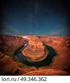 Grand Canyon at night under the light of the stars in the sky. Стоковое фото, агентство Ingram Publishing / Фотобанк Лори