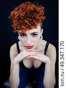 Young and cool redhead woman . Стоковое фото, агентство Ingram Publishing / Фотобанк Лори