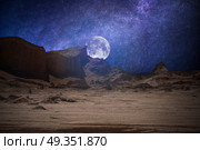 Valle de la Luna (Moon Valley) close to San Pedro de Atacama, Chile. starry sky shines at night.. Valle de la Luna (Moon Valley) . Стоковое фото, агентство Ingram Publishing / Фотобанк Лори