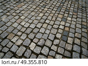 Granite cobblestone pavement in Germany street outdoor. Granite cobblestone pavement in Germany street. Стоковое фото, агентство Ingram Publishing / Фотобанк Лори