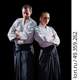 Two martial arts fighters isolated. Two martial arts fighters. Стоковое фото, агентство Ingram Publishing / Фотобанк Лори