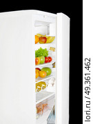 Refrigerator filled with fruit and other useful meal. Healthy food. Стоковое фото, агентство Ingram Publishing / Фотобанк Лори