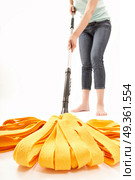 The person cleans a floor a mop on a white background. Cleaning. Стоковое фото, агентство Ingram Publishing / Фотобанк Лори