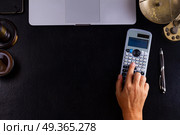 Workspace hero header with law gavel. Workspace hero header with law gavel and laptop keyboard, domeones hand calculating something top view, copy space on desktop. Стоковое фото, агентство Ingram Publishing / Фотобанк Лори