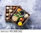 Vegan chocolate truffles. Dietary sweets with chickpeas, raisins, dried apricots and nuts. Clean food. Стоковое фото, агентство Ingram Publishing / Фотобанк Лори
