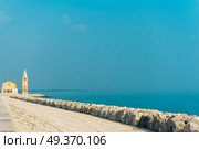 Church of Our Lady of the Angel on the beach of Caorle Italy, Santuario della Madonna dell'Angelo. Стоковое фото, агентство Ingram Publishing / Фотобанк Лори