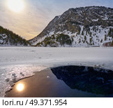 Panticosa snow frozen lake ice in Huesca Pyrenees of Spain. Стоковое фото, агентство Ingram Publishing / Фотобанк Лори