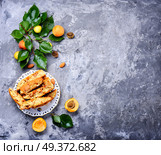 Variety of biscotti - cantucci, cantuccini, kind of biscuit, with the addition of almonds and dried fruits. Popular Italian biscotti. Стоковое фото, агентство Ingram Publishing / Фотобанк Лори