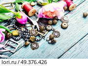 Stylish female jewelry made of chains, beads and pendants.. Design and bijouterie. Стоковое фото, агентство Ingram Publishing / Фотобанк Лори