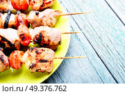 Grilled shish kebab or shashlik on skewers.Fast food.BBQ. Grilled meat skewers, shish kebab. Стоковое фото, агентство Ingram Publishing / Фотобанк Лори