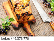 Ireland soda bread with black currant berries.Food concept. Irish freshly baked bread. Стоковое фото, агентство Ingram Publishing / Фотобанк Лори