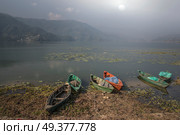 Pokhara - a city in central Nepal, the administrative center of the district helmets, Gandaki Zone and the Western region. On the banks of Lake Phewa. Стоковое фото, агентство Ingram Publishing / Фотобанк Лори