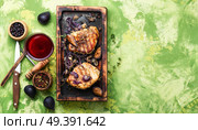 Baked pork meat in marinade with onion and figs.Steak with fruit sauce. Meat steak with figs. Стоковое фото, агентство Ingram Publishing / Фотобанк Лори