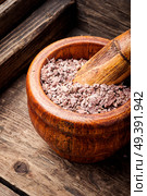 Grinded rhizomes of plant iris in mortar.Herbal medicine.Herbalism. Grinded rhizomes of iris. Стоковое фото, агентство Ingram Publishing / Фотобанк Лори