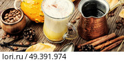 Pumpkin spice latte.Cup with autumn coffee.Coffee drink.Autumn hot drink. Pumpkin coffee with whipped cream. Стоковое фото, агентство Ingram Publishing / Фотобанк Лори