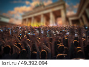 concert on the background of the Brandenburg Gate. Berlin. A crowd of people celebrating a holiday. Стоковое фото, агентство Ingram Publishing / Фотобанк Лори