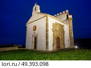 Ermita la Guia hermitage in Ribadesella Asturias of Spain. Стоковое фото, агентство Ingram Publishing / Фотобанк Лори