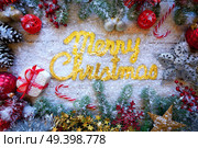 Merry Christmas spell word on white snow background. Стоковое фото, агентство Ingram Publishing / Фотобанк Лори