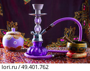 hookah shisha smoke and singing bowl tibetan. Стоковое фото, агентство Ingram Publishing / Фотобанк Лори