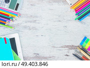 back to school frame with school supplies on wooden table. back to school frame. Стоковое фото, агентство Ingram Publishing / Фотобанк Лори