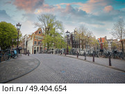 Traditional old buildings in Amsterdam, the Netherlands. Стоковое фото, агентство Ingram Publishing / Фотобанк Лори
