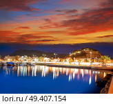 Denia sunset with castle and marina at Alicante in Spain. Стоковое фото, агентство Ingram Publishing / Фотобанк Лори