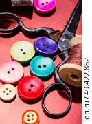 Bright assorted sewing buttons in mix colors. Multicolored decorative buttons. Стоковое фото, агентство Ingram Publishing / Фотобанк Лори