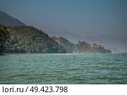 Lake Phewa - at the second largest lake in Nepal located in the Pokhara Valley near Pokhara and Sarangkot mountain. Стоковое фото, агентство Ingram Publishing / Фотобанк Лори