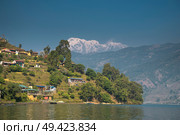 Lake Phewa - at the second largest lake in Nepal located in the Pokhara Valley near Pokhara and Sarangkot mountain. Стоковое фото, агентство Ingram Publishing / Фотобанк Лори