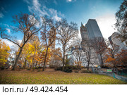 New York City Manhattan Central Park panorama in Autumn lake with skyscrapers and colorful trees with reflection. Стоковое фото, агентство Ingram Publishing / Фотобанк Лори