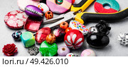 Jewelry making and beading process.Colored beads.Bead mix. Bead for making jewelry. Стоковое фото, агентство Ingram Publishing / Фотобанк Лори