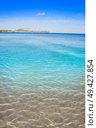 Playa de Fossa beach in Calpe of Alicante in Spain also Levante beach Calp. Стоковое фото, агентство Ingram Publishing / Фотобанк Лори